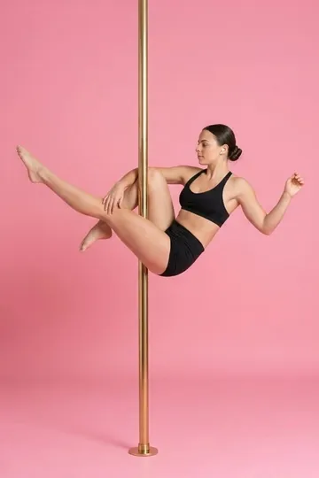 Pole dancer in a Martini Sit, one leg extended forward